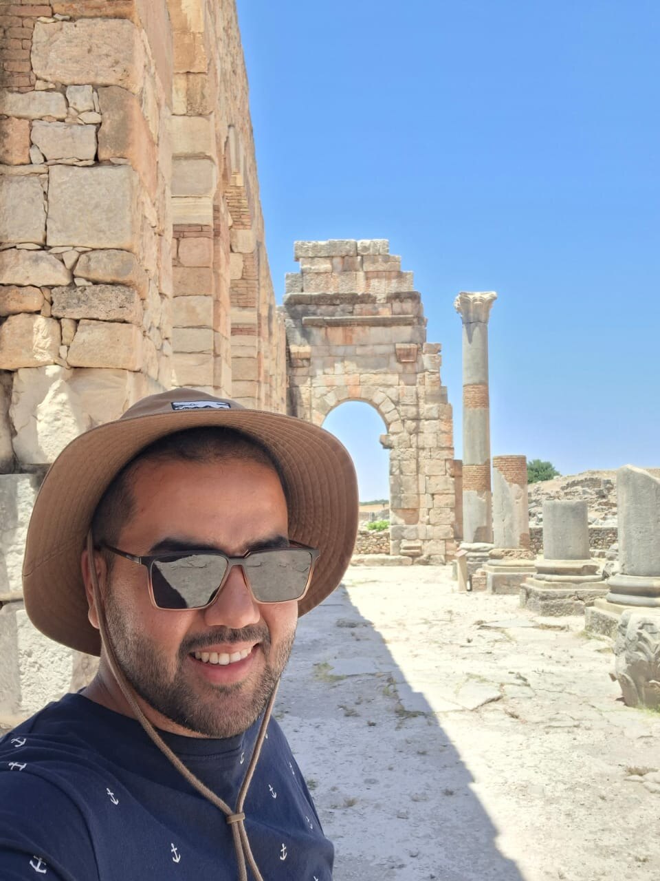 Ayoub at the ancient ruins of Volubilis