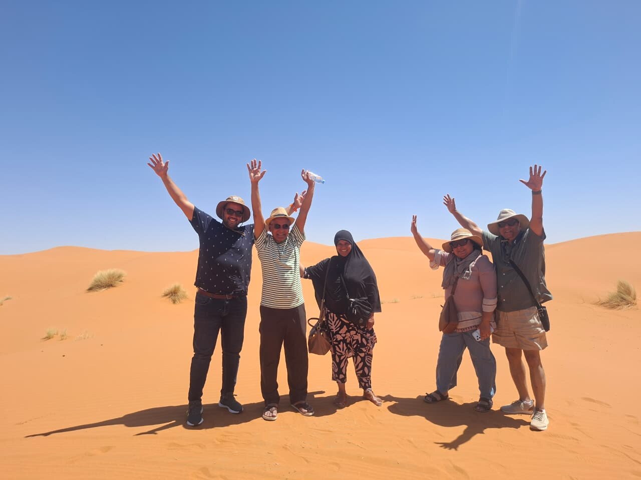 Ayoub welcoming guests in the Sahara