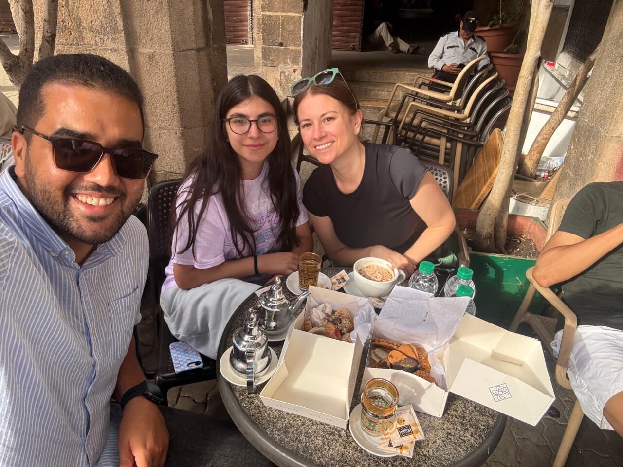 Moroccan tea and pastries with guests